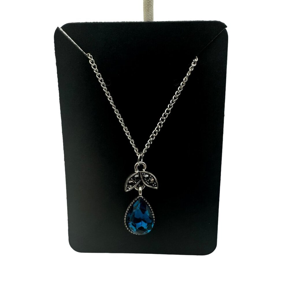 Elegant Silver Chain Necklace With Blue Gemstone Teardrop Pendant & Leaf Accents